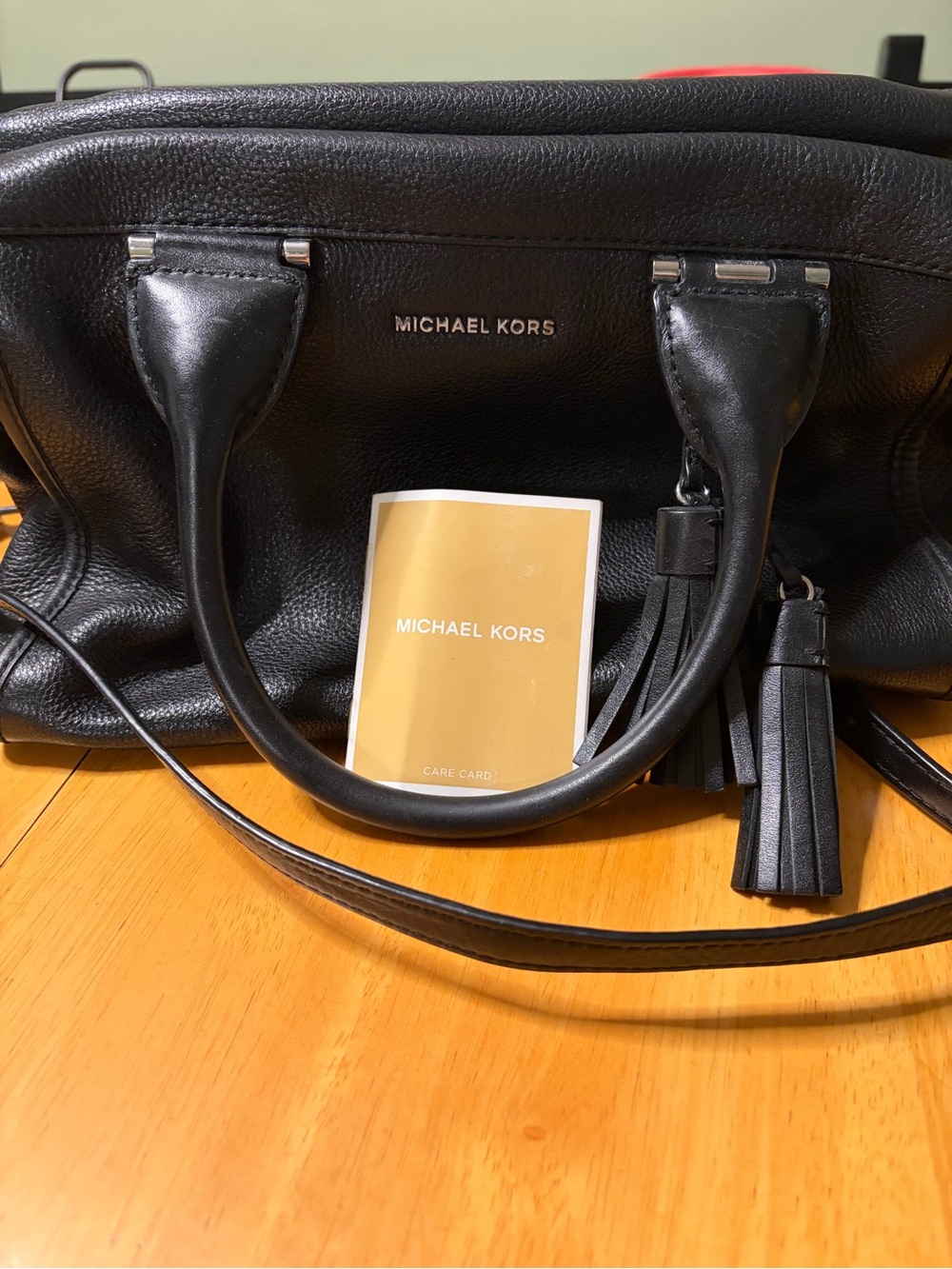 Michael Kors Black Pebbled Leather Satchel with Tassel Accent